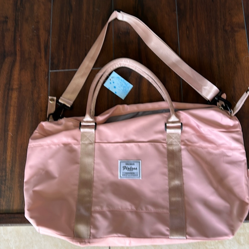 Pink duffel bag